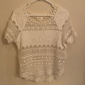 Crocheted oversized white tee.